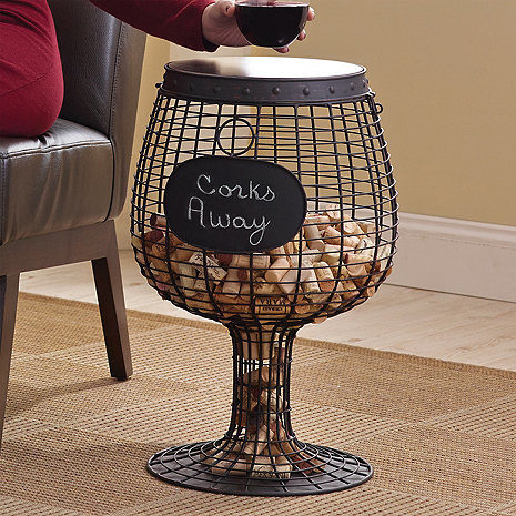 Keep track of the fact that you have a problem with this cute <a href="http://www.wineenthusiast.com/wine-glass-cork-catcher-accent-table.asp" target="_blank">cork holder</a>. Nothing like getting a decoration and a rude awakening all in one!