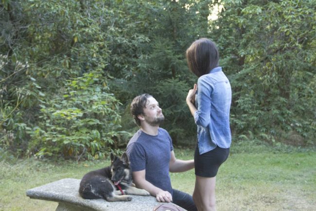 With the precious puppy waiting patiently by his side, he dropped to one knee and asked his favorite lady if she'd spend the rest of her life with him!