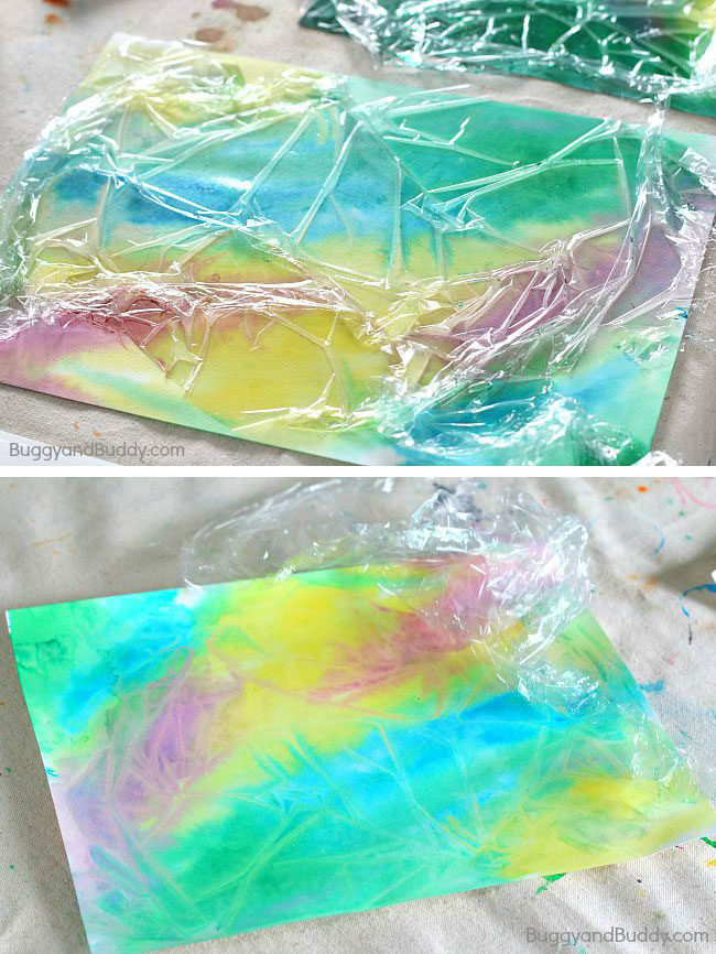 Create fun, kid-friendly art projects with some plastic wrap and watercolor paints.