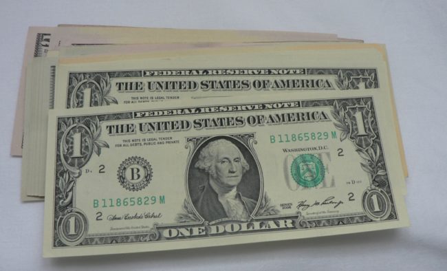 Hold up a dollar and tell your friends that it is up for auction. The highest bidder gets the dollar, but the second- and third-place bidders are still required to pay off their bids. They'll ultimately offer up amounts that are worth way more than the prize.