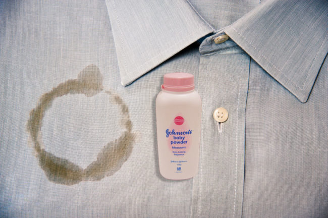 You can easily get grease stains out of clothing by rubbing some baby powder into the spot, brushing it off, and repeating. Later, just wash it like normal!