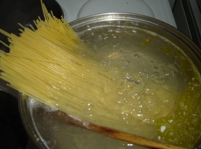 Cook pasta faster by using a bigger pot, adding salt to the water, and covering it with a lid.