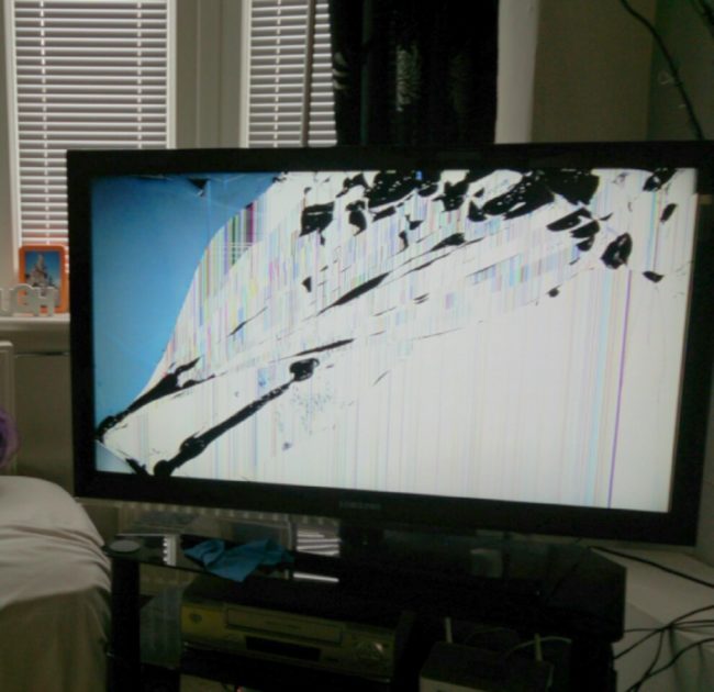 This guy taped an image onto his TV...it's not actually broken. His fianc&eacute;e was not pleased.