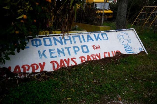 Here is a fallen sign from when the preschool was still operating. It was called "Happy Days Baby Club."