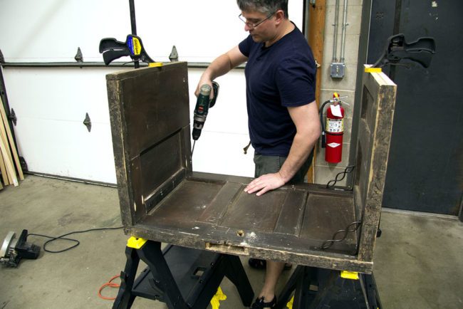 After those were cut, he fastened the legs to the top with wood glue and heavy screws.