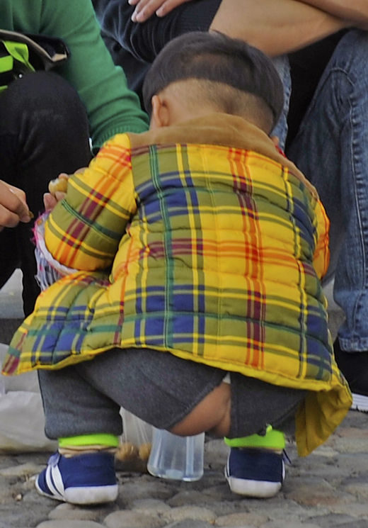 Kids wear split-crotch pants so that they can poop anywhere (literally).