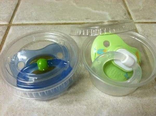 Disposable sauce containers are a great place to store pacifiers.
