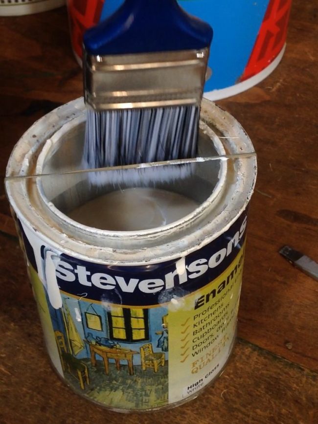 Remove excess paint from brushes by wrapping a rubber band around the can. No more messy drips!