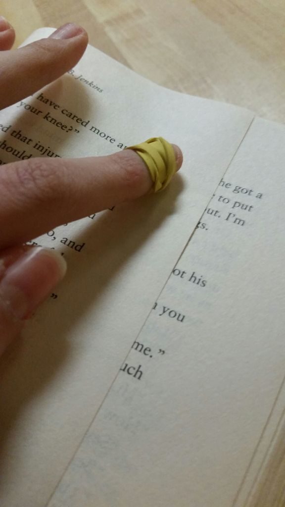 If you're having trouble flipping pages, wrap a rubber band around your finger.