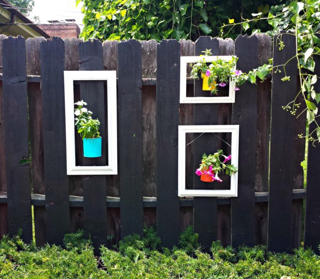 Old frames with fresh coats of paint perfectly complement small planters.