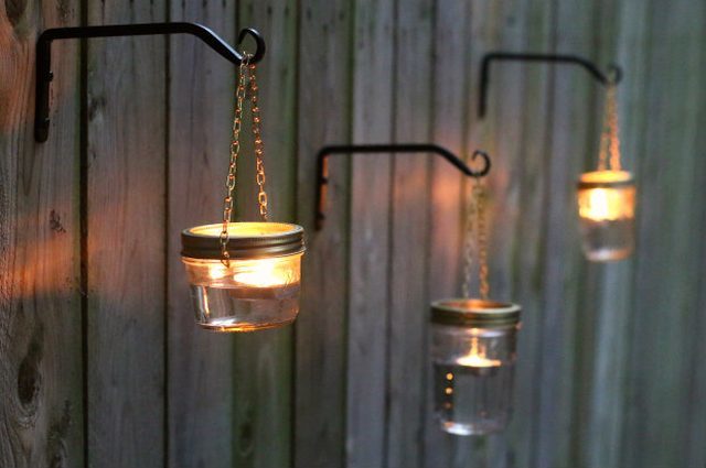 These mason jar lights add just the right amount of ambience to your backyard.