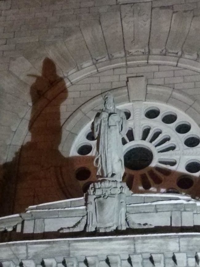 The reaper watches over this church at night.