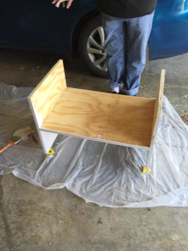 With a few boards, they created this bench that would later double as a storage unit.