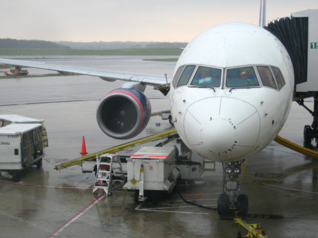 Since the plane was still at the gate, he called his uncle to tell him about the exciting speech.