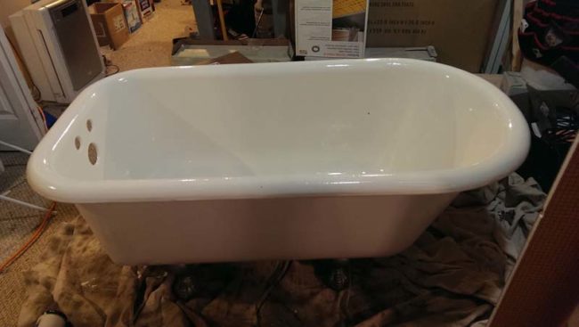 Once the paint dried, the tub was ready for the bathroom...and the total cost was only $300.