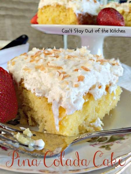 The holes of this poke cake are filled with <a href="http://cantstayoutofthekitchen.com/2014/05/10/pina-colada-cake/" target="_blank">cream of coconut</a> -- YUM.