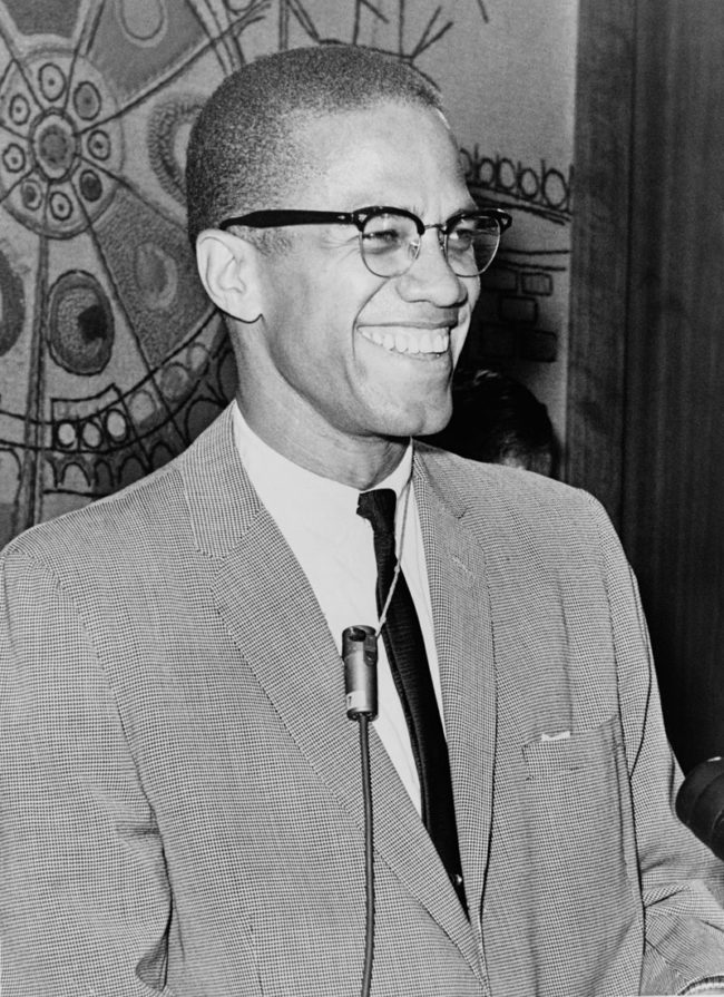 1965: Malcolm X is shot and killed in New York City.