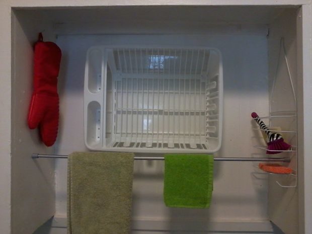 You can also make a hidden drying rack in your cabinets.