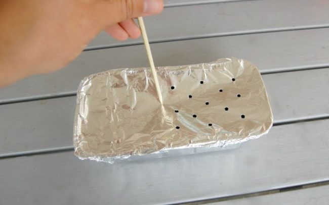 Use an aluminum bread pan, hickory chips, foil, and a skewer to <a href="http://happymoneysaver.com/easy-homemade-bbq-smoker-plans/" target="_blank">create your own smoker</a> for under a buck.