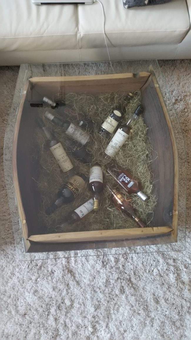 The best part? He chose to store whiskey bottles inside!