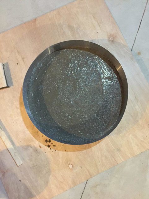 Mixing concrete might seem scary to the average crafter, but the blogger assures us that it's not as hard as it looks!