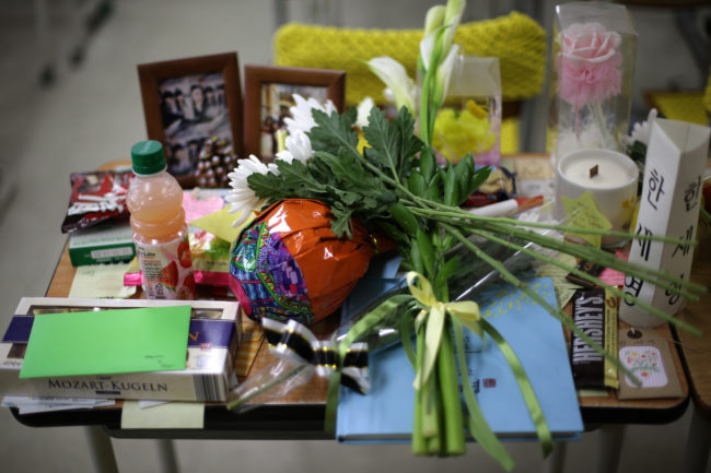 School administrators have made the commemorative space a permanent fixture where students, parents, teachers, and friends can express their sorrow and pay their respects.