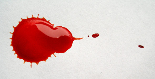 Start by writing your full name on the paper. Put a drop of blood next to it.