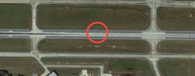 If you have a keen eye and you're flying in on runway 10, you'll notice two concrete slabs that don't look like they belong there.