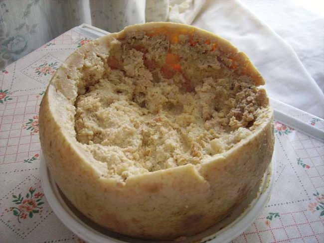 Casu marzu actually begins as a different kind of cheese altogether called pecorino sardo. However, instead of letting the cheese ripen in a darkened basement, cheesemakers bring the pecorino sardo outside and place it in the sun. There flies are allowed to lay eggs in it.