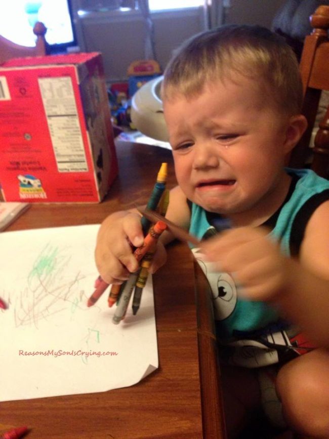 He couldn't fit all of the crayons in one hand.