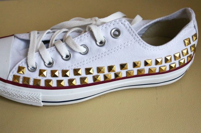 You can also just glue on <a href="http://www.abeautifulmess.com/2013/11/make-your-own-studded-converse.html" target="_blank">some studs</a>.