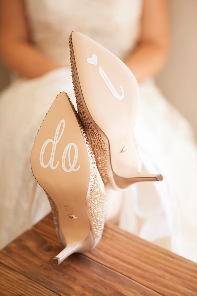 <a href="http://somethingturquoise.com/2015/09/25/diy-wedding-shoe-stickers/" target="_blank">Create custom stickers</a> for the bottom of your shoes.