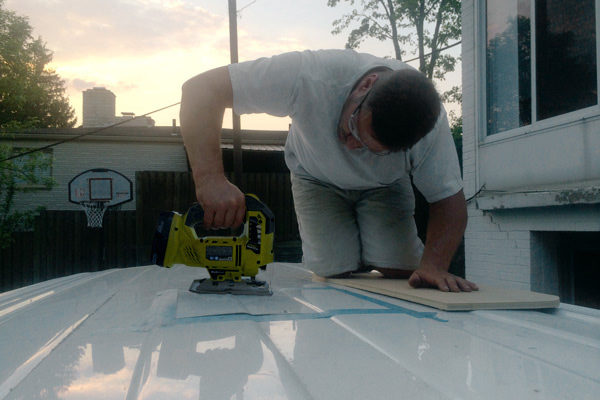 Then it was time to cut open the roof...yes, you read that right! This would allow for a fan and extra sunlight.