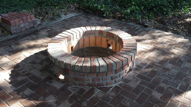 If you've got some leftover bricks from another home project, throw 'em in there!