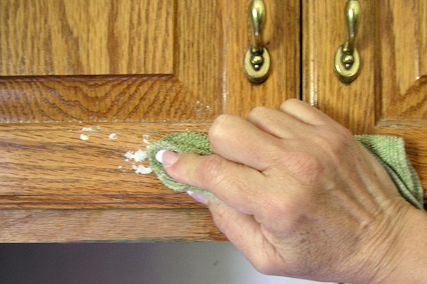 Mix baking soda, dish detergent, and vinegar to <a href="http://www.ehow.com/how_4778378_clean-grease-kitchen-cabinet-doors.html" target="_blank">scrub dingy cabinets</a>. 