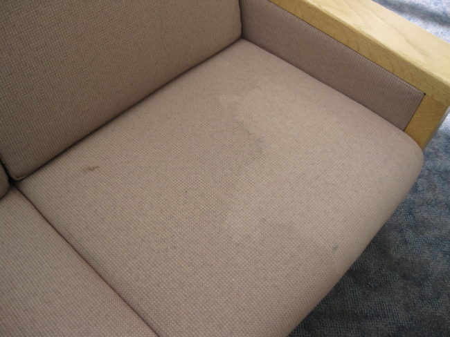 Combine equal parts Dawn dish soap, white vinegar, and club soda to clean water stains off of upholstery.