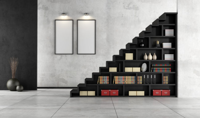 Why waste all that space under the stairs? Install a bookshelf that's functional and has visual appeal.