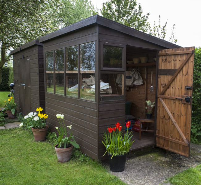 Get rid of all the crap you don't need in your backyard shed, add some windows, and create an outdoor getaway.