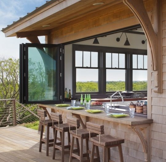 Install accordion windows to bridge the gap between outside and in.