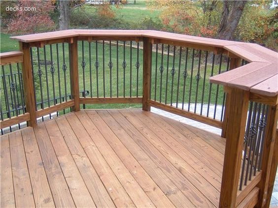 Extend deck railings and get some barstools to create an outdoor bar for entertaining.
