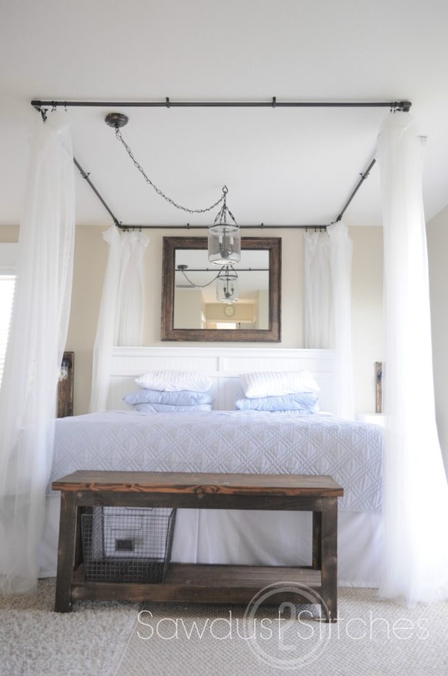 Use <a href="http://sawdust2stitches.com/" target="_blank">PVC pipes</a> and curtains to create a cozy canopy bed.