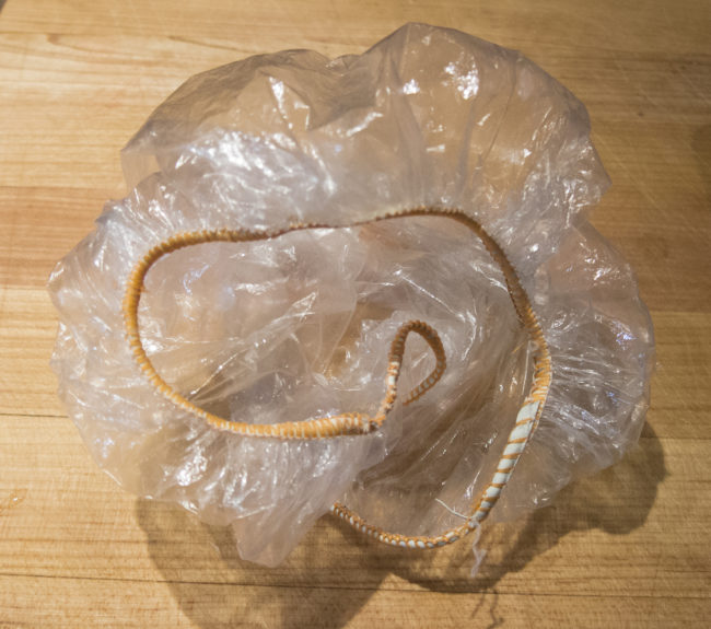 Bring disposable shower caps home from hotels and reuse them by wrapping them around shoes when you pack them in your suitcase.