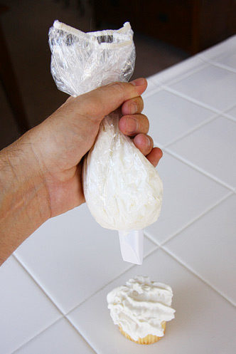 No piping bag? No problem...just grab one of those unused shower caps!