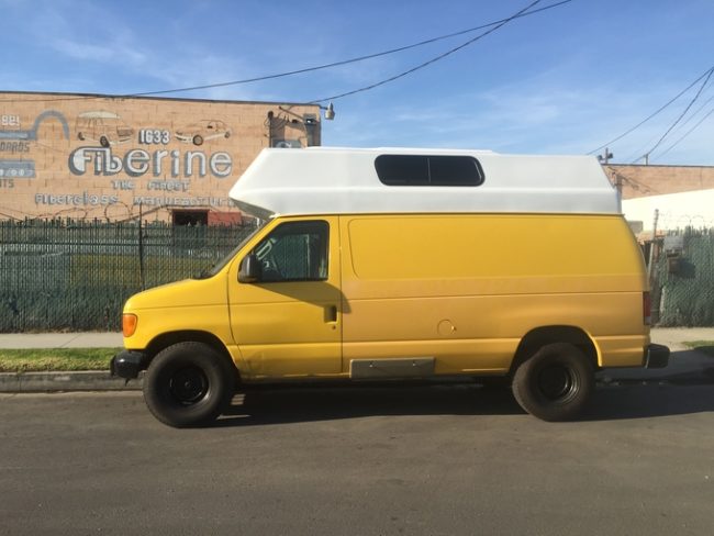 He had a high top roof made for the van -- this was crucial...