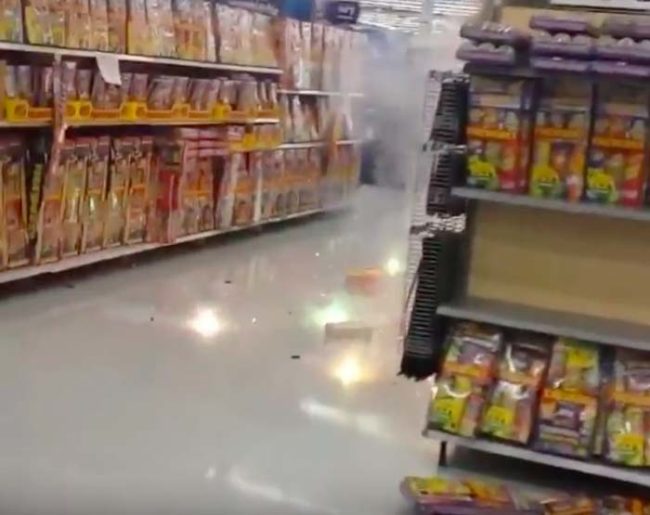 For whatever reason, they decided it would be a good idea to light up the entire fireworks display inside the store and hightail it out of there.