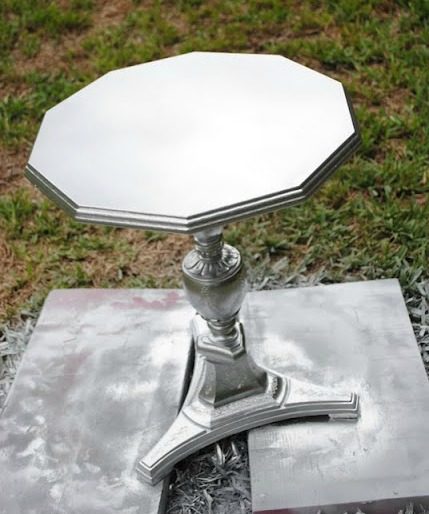 Use spray paint to take that antique table from <a href="http://www.craftionary.net/guest-post-metallic-paint-with-antique-glaze-finish/" target="_blank">drab to fab</a> in mere minutes!