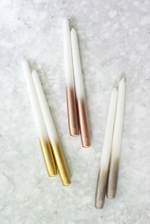 I can't be the only one who decorates with candles that'll never, ever see a flame. Create a sweet ombre effect to make them <a href="http://oleanderandpalm.com/2014/11/diy-metallic-dipped-taper-candles.html" target="_blank">next-level gorgeous</a>.