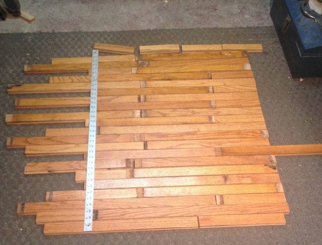 "You want to eat off the floor, Mom? Then I'll make a table out of it," said this guy, probably. First, he laid out the boards and figured out where he needed to trim them.