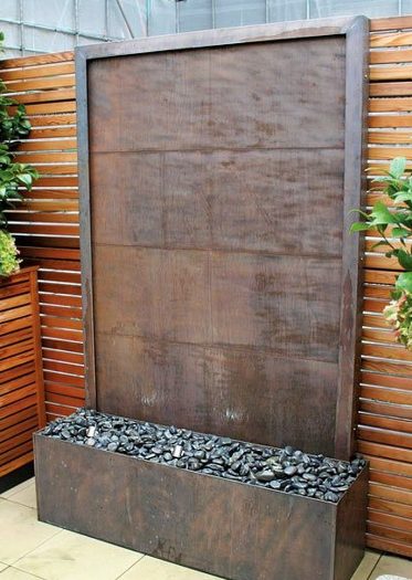 Impress just about everyone who comes over by <a href="http://diyprojects.ideas2live4.com/2015/12/15/how-to-build-a-glass-waterfall-for-your-backyard/" target="_blank">making a glass waterfall</a>.