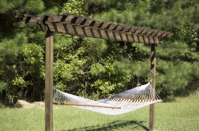 Take in all the backyard bliss by <a href="http://dfohome.com/blog/2015/10/how-to-build-a-diy-pergola-hammock-stand-in-a-weekend-for-under-200/?pp=0" target="_blank">building your own pergola</a> and chillin' on a hammock.